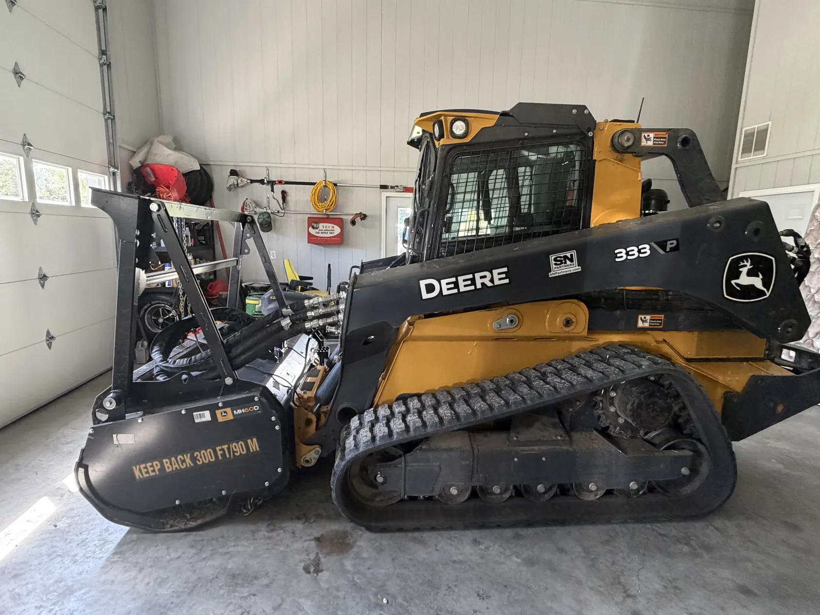 John Deere 333P compact track loader with an MH60D forestry mulching head